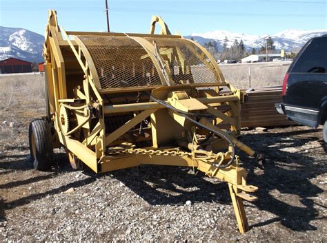 used pull behind rock picker